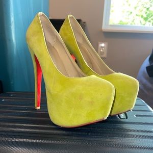 Super tall green suede heels